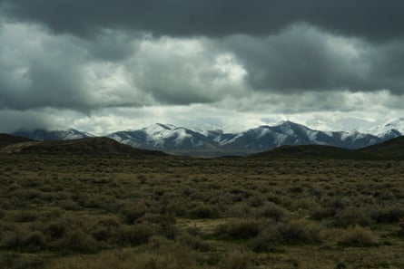 a landscape with mountains beyond