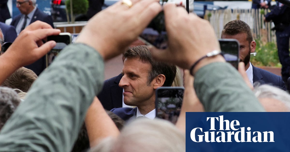 Macron’s centrist grouping to lose absolute majority in parliament, say projected results
