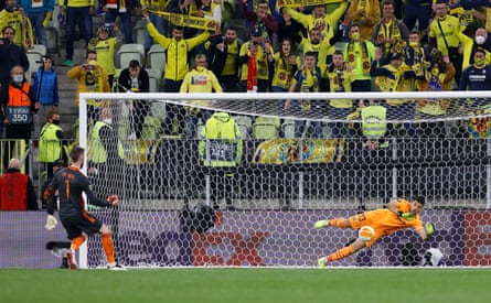 Rulli saves De Gea’s kick to win the Europa League.