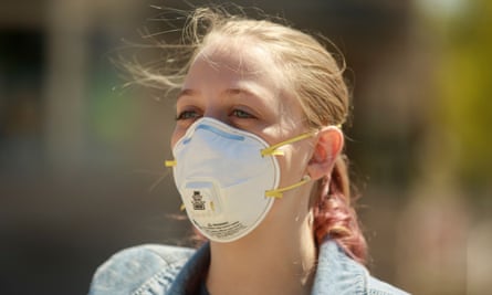 A woman wears an N95 repirator mask in Indiana on 22 April.