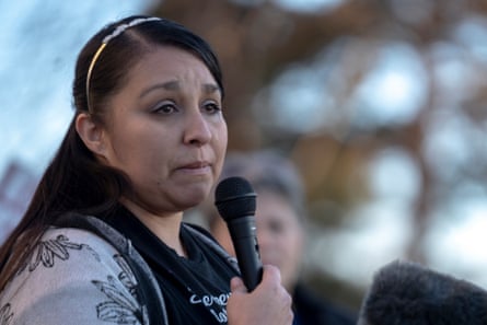 Elaine Maestas talks about her sister, who was killed by sheriff’s deputies, during a candlelight vigil.