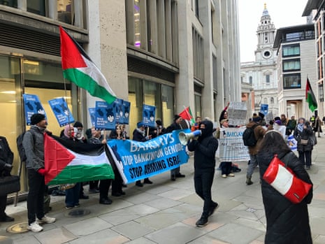Protesters outside the FT Banking Summit