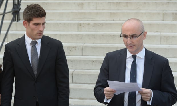 Ched Evans outside court as his lawyer reads out a statement following the not guilty verdict in his retrial.