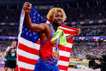 Noah Lyles celebrates winning the 200m in Tokyo in 2025