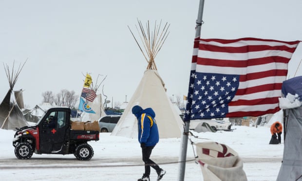 ‘The message is don’t bother going out on the frontlines or we are going to hit you with felonies,’ says an activist at the North Dakota camp. 