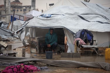 Displaced civilians in Gaza shelters in their tent