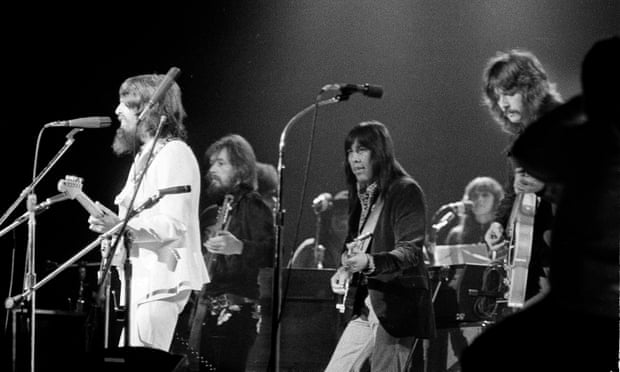 George Harrison, Klaus Voorman, Jesse Ed Davis, and Eric Clapton onstage in 1971.