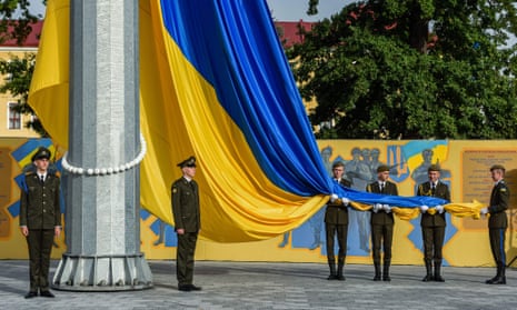 Ukrainian members of the honour guard attend a ceremony to mark the Day of the National Flag of Ukraine, in the western city of Lviv.