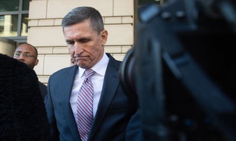 Flynn leaves after the delay in his sentencing hearing at US District Court in Washington, DC.