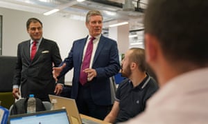 The CBI president, Lord Bilimoria, (left) with Keir Starmer during a walkabout in the offices of the software company Advanced at the Mailbox in Birmingham before the Labour leader’s speech to the CBI annual conference.