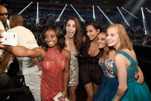 Olympic athletes Simone Biles, Aly Raisman, Laurie Hernandez and Madison Kocian pose for a selfie with Kim Kardashian