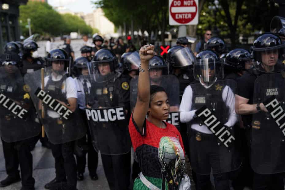 Demonstrator gather to protest the death of George Floyd near the White House on 30 May 2020.