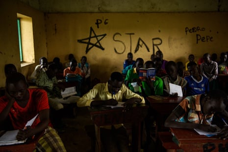 Pupils copy notes from a blackboard at the Pibor boys’ school.