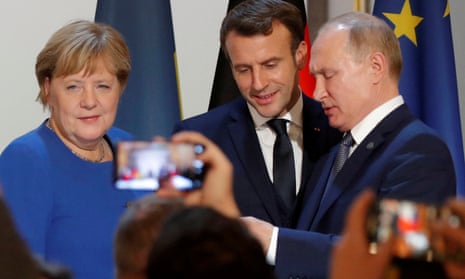 Angela Merkel with Emmanuel Macron and Vladimir Putin in December 2019.