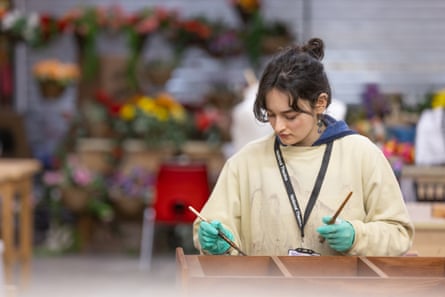 Ray-Dobson sits at her prop-making desk at the National Theatre.