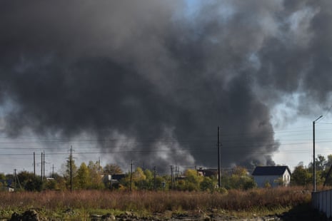 Smoke rises over the city after Russian missile strikes on Lviv.