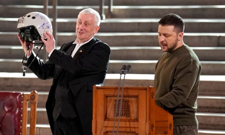 Speaker of the House of Commons, Sir Lindsay Hoyle, holds the helmet of one of the most successful Ukrainian pilots, inscribed with the words "We have freedom, give us wings to protect it", which was presented to him by Volodymyr Zelenskiy.