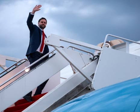 US vice-president JD Vance waves as he boards Air Force Two to depart for Budapest, at Joint Base Andrews, Md.