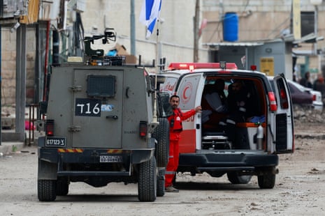 An ambulance is checked during an Israeli raid, in Jenin, in the occupied West Bank, on Wednesday.