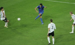 Fabio Grosso fires the ball past Michael Ballack and into the net, breaking the deadlock in the last minute of extra time