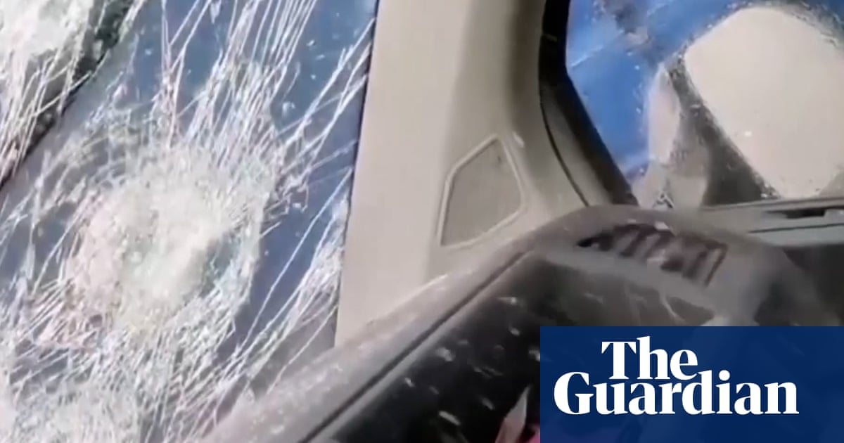 Violent hailstorm smashes windscreens and halts traffic in northern Italy – video