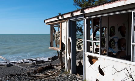 A house destroyed by coastal erosion and rising sea levels at Hawkes Bay, New Zealand.