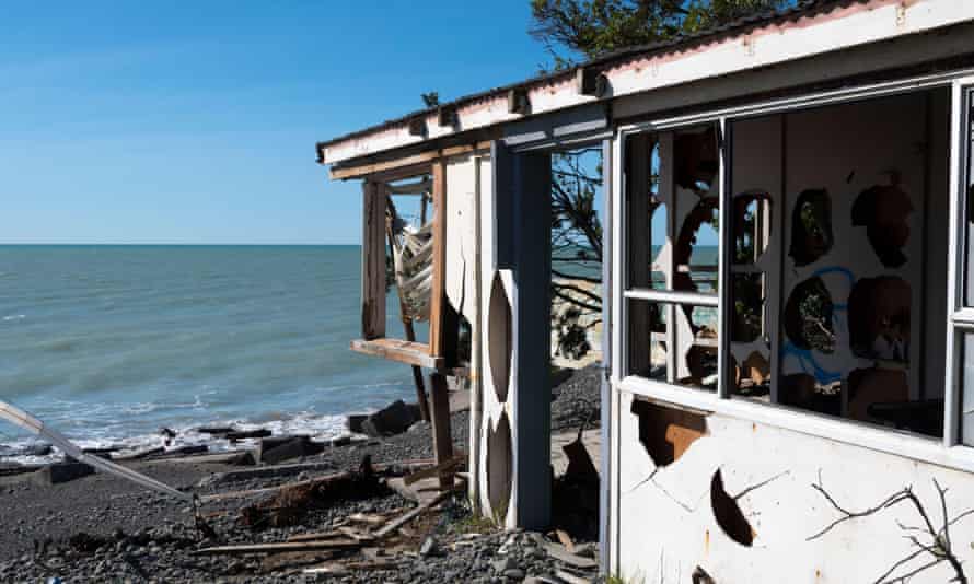 A house destroyed by coastal erosion and rising sea levels, Haumoana Beach, Hawkes Bay, New Zealand.
