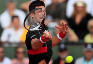 Djokovic returns.