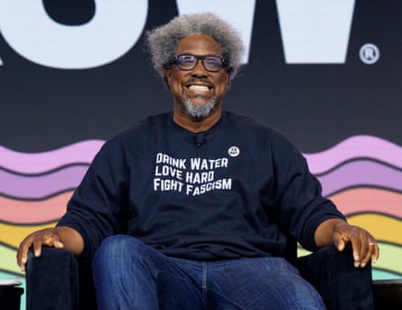 A man sitting on a chair smiling