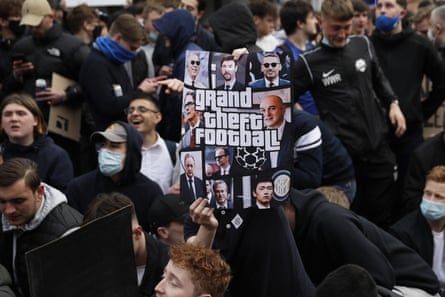 Chelsea fans protest outside Stamford Bridge in April 2021 protesting against attempts to form a new European Super League
