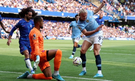 Erling Haaland scores Manchester City’s first goal against Chelsea.
