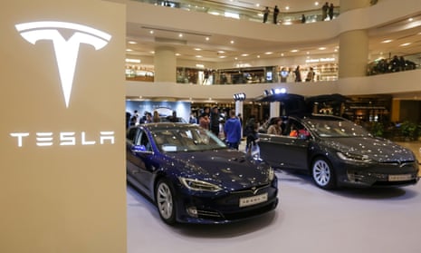 Tesla vehicles on display at a shopping mall in Hong Kong