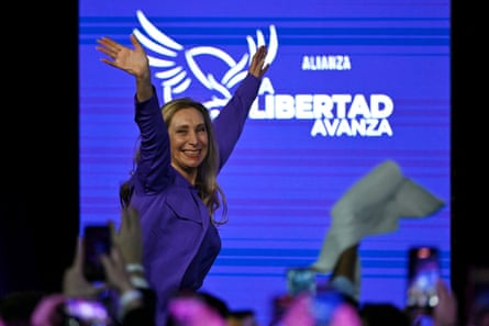 Karina Milei waves to supporters