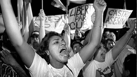 In 1996, demonstrators gather outside the Brothers to the Rescue hangar at Opa-Locka Airport, protesting Cuba’s shootdown of two of the organization’s planes