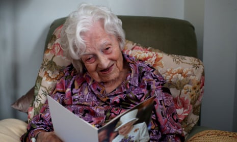 Gladys Hooper looking at a birthday card ahead of her 112th birthday.