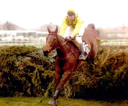 John White and Esha Ness scale the last fence of the 1993 Grand National Course