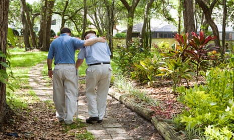 Man walking with elderly father