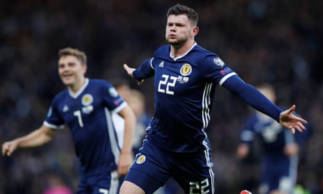 Oliver Burke celebrates scoring Scotland’s late winner.