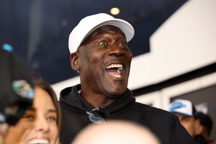 Michael Jordan (pictured) celebrates in victory lane after Tyler Reddick, the No 23 car driver who joined his team in 2024,