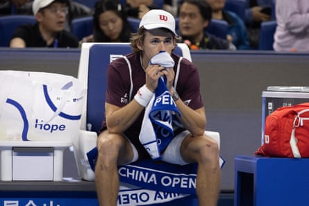 Alex de Minaur after retiring from China Open final