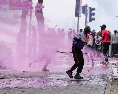 People protest for the one-year anniversary of deadly anti-tax demonstrations in Nairobi, Kenya, Wednesday, June 25, 2025.