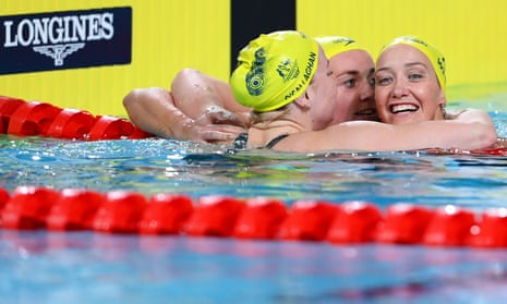 Mollie O'Callaghan, Ariarne Titmus and Madi Wilson celebrate winning silver, gold and bronze in the women's 200m freestyle at the Commonwealth Games in Birmingham.