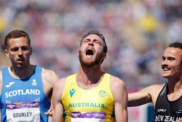 Australia’s Oliver Hoare (centre) celebrates after winning the men’s 1500m final.
