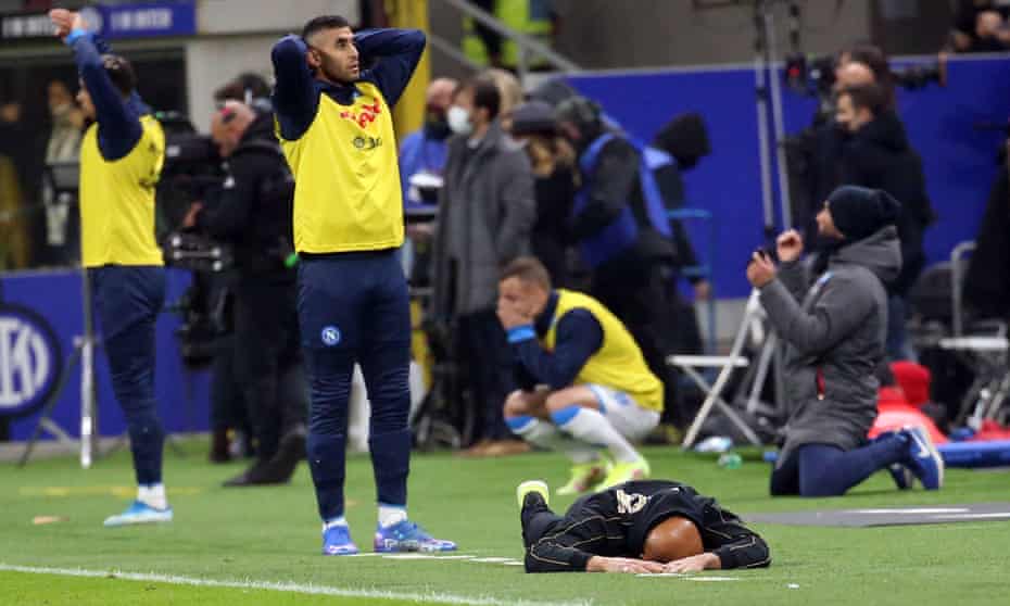 Napoli head coach Luciano Spalletti throws himself to the floor after Dries Mertens’ late miss at Inter.