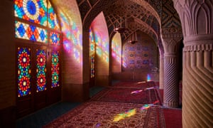 Light floods in through stained glass windows at Nasir-al-Molk mosque, Shiraz, Iran.