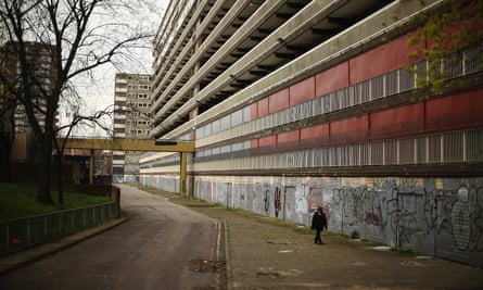 Demolition and displacement … a boy walks through the condemned Heygate Estate in London in 2013.