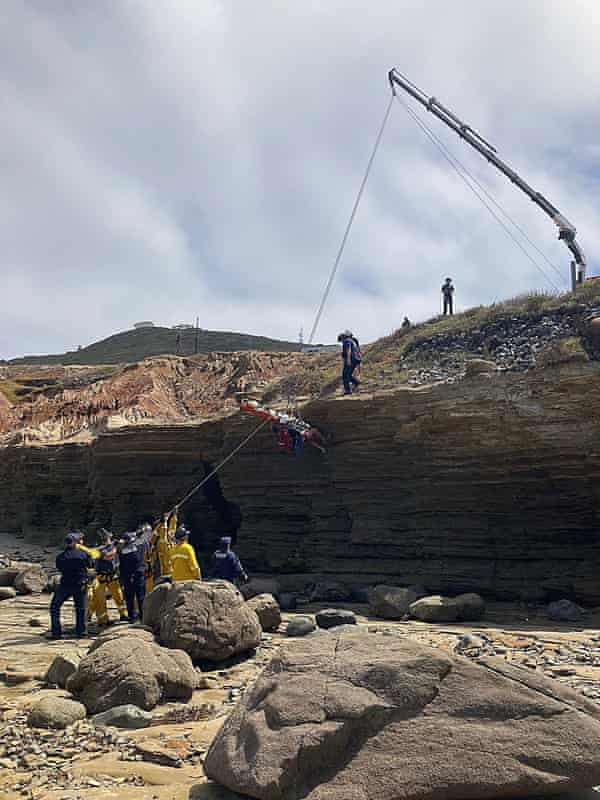 Rescue workers at the scene on Sunday.