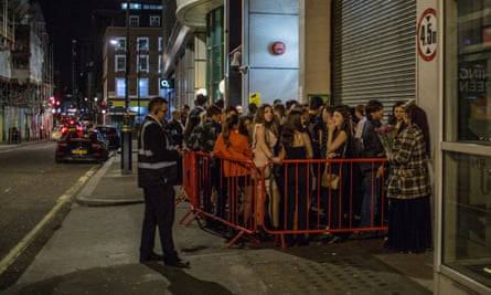 Clubbers queueing outside Scandal near London’s Oxford Circus.
