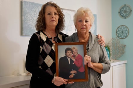 women holding a photo frame