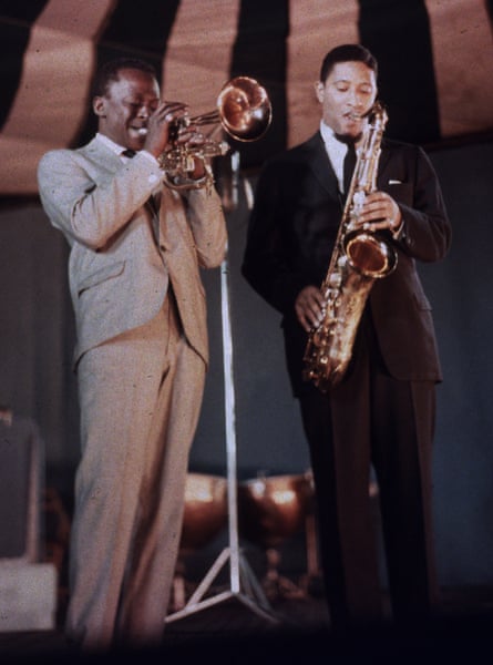 Miles Davis and Sonny Rollins perform together in 1957.